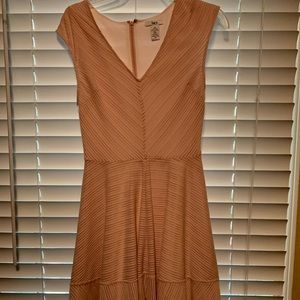 Blush colored, laser cut fit and flare dress